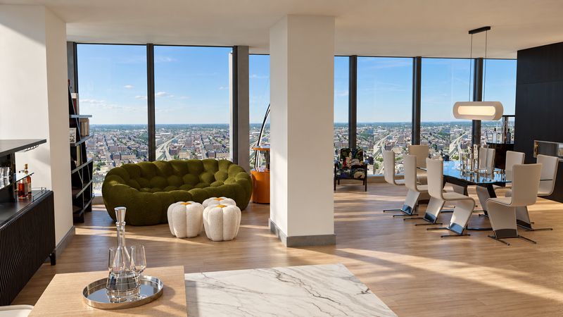 Green sofa and dining table with panoramic skyline views, design visualization