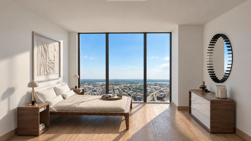 Bedroom with a wood bed and a round mirror, design visualization