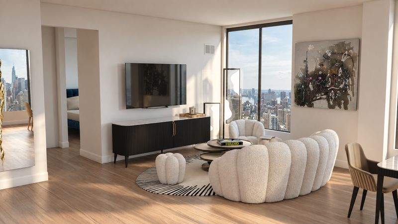 Living room seen from the entry, with a black media console, design visualization