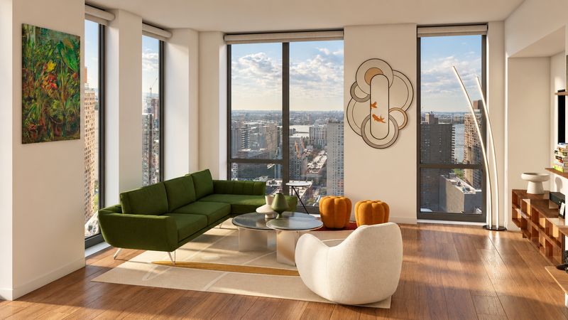 Living room with a green sofa, a glass coffee table, and river views, design visualization