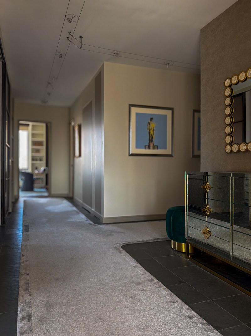 Art and a long runner in the hallway