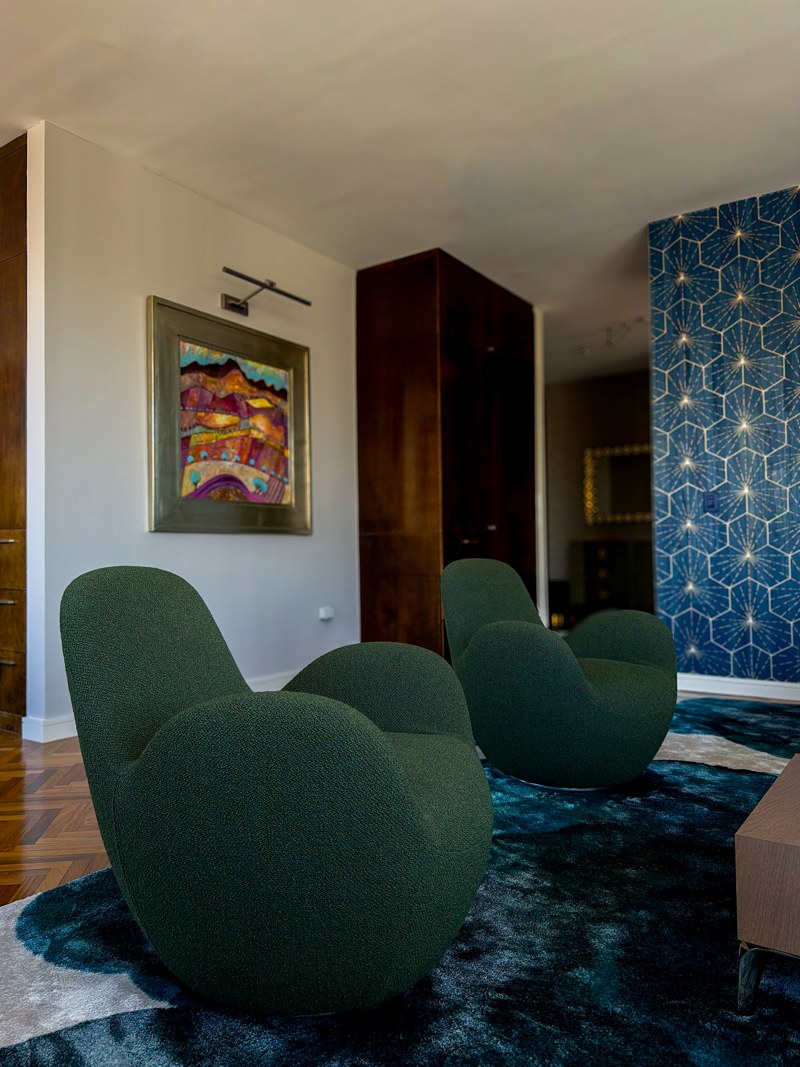 Sculptural green lounge chairs