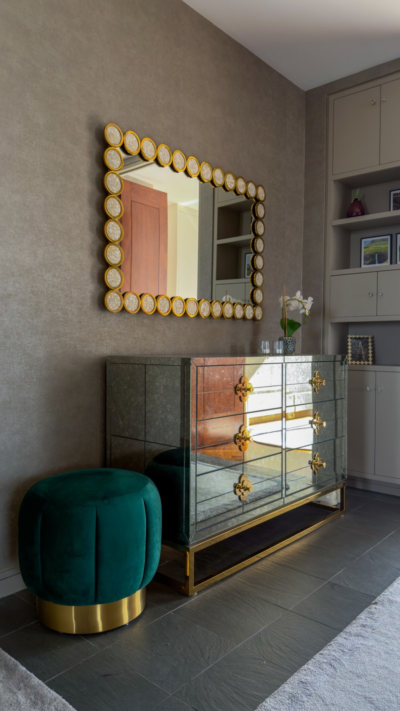 The mirrored entry console